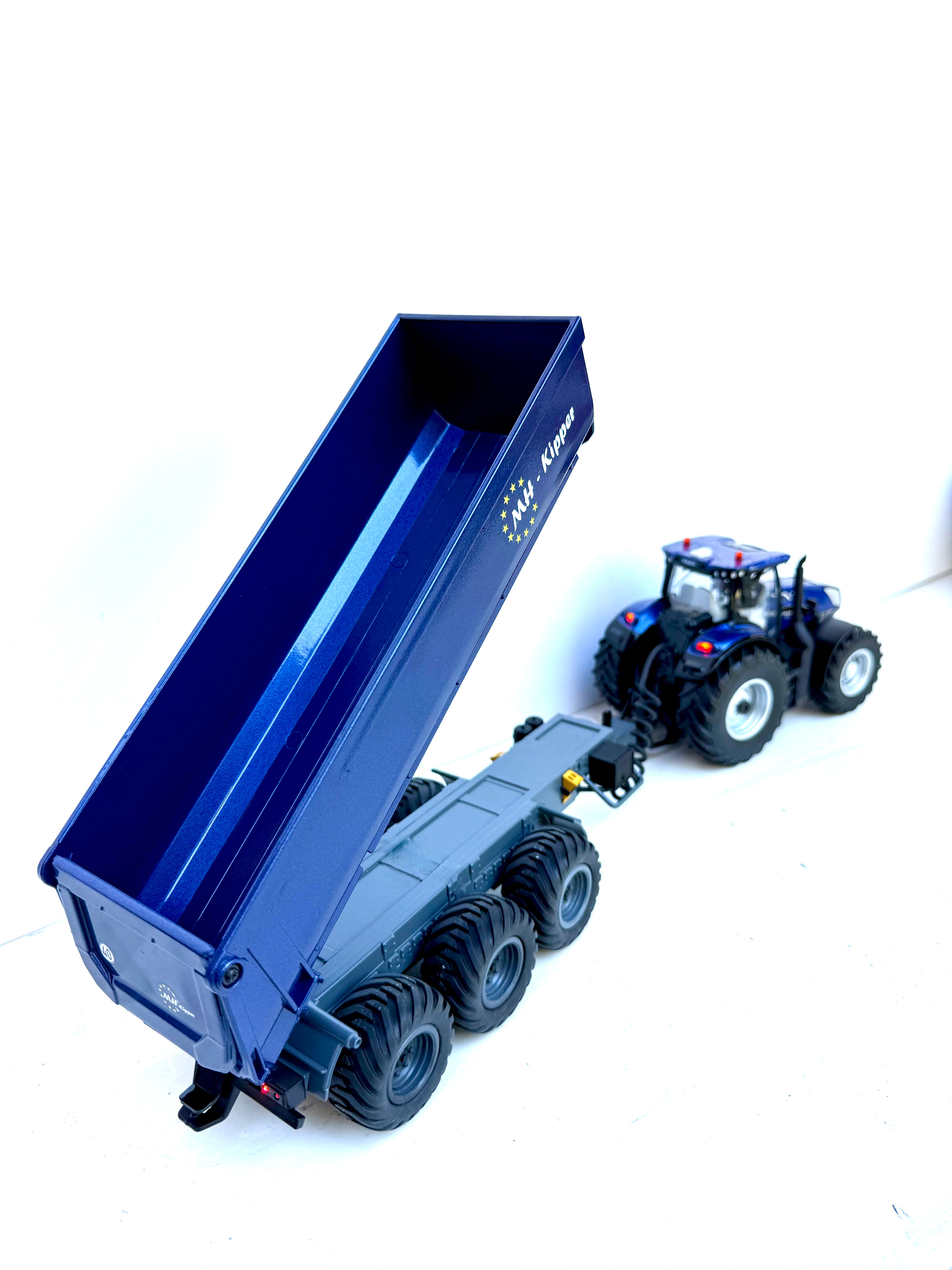 Siku Control 6780 Schmitz Dreiachser Kipper Umbau 1:32 New Holland blau – erhöhter Kippwinkel
