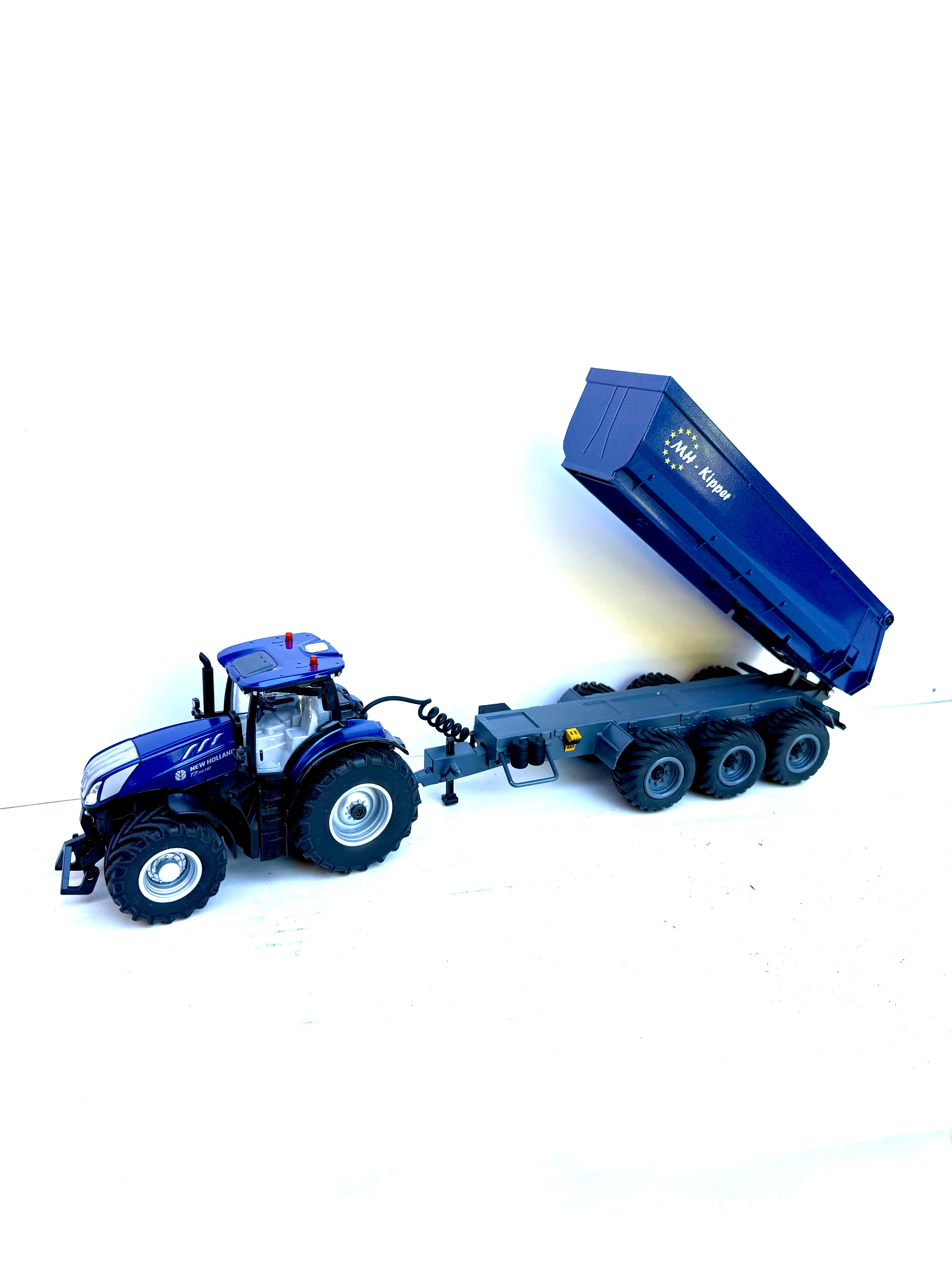 Siku Control 6780 Schmitz Dreiachser Kipper Umbau 1:32 New Holland blau – erhöhter Kippwinkel