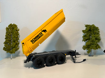 Seitenansicht:
Kipper in gelb, Felgen in schwarz
Mulde hoch gekippt