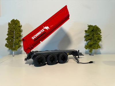 Seitenansicht:
Kipper in rot, Felgen in schwarz
Mulde hoch gekippt