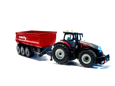 Seitenansicht:
Kipper in rot, Felgen in schwarz, mit Trecker