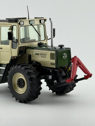 mb-trac-1100-silberdistel-weise-toys-1085-1-32-front-seitlich.