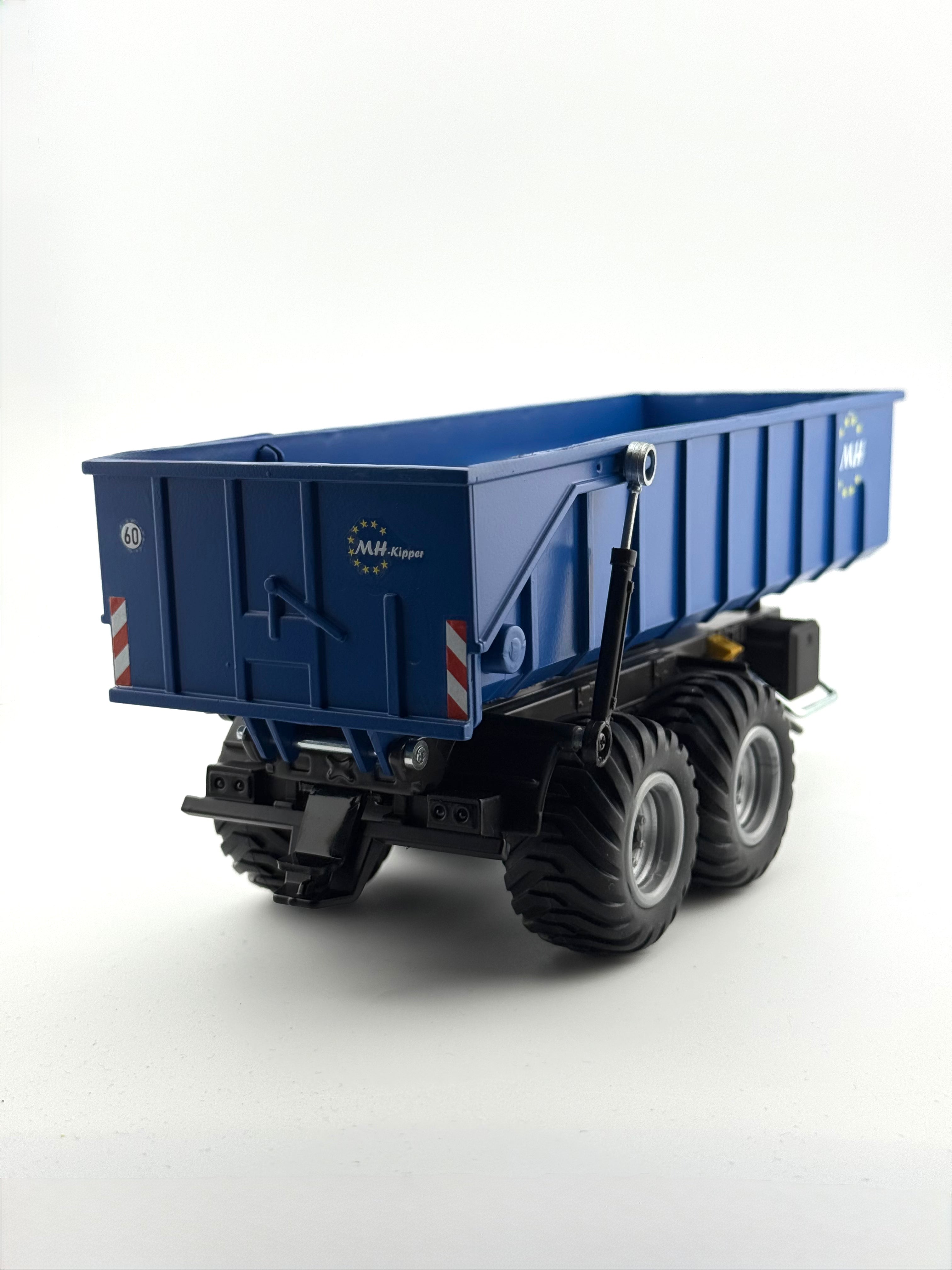 Detailansicht des SIKU Control 6780 Baustellenkipper Umbaus im Maßstab 1:32 mit realistischer Mulde, Fahrwerk und RC Technik für Modellbau